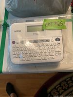 Brother PT-D400 label maker bagged