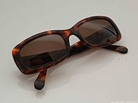 Front angled view showing frame shape and lens tint