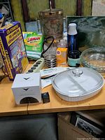 Overall view of assorted household items on table