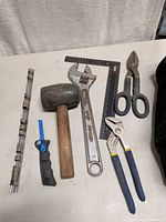 Group of hand tools on table