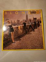 Front cover showing album artwork and sticker residue