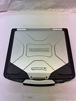 Closed Toughbook CF-31 top view showing silver lid and black bumpers