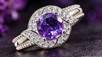 Front angled view of the ring displaying amethyst center and CZ halo
