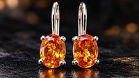 Front view of both citrine earrings showing stone color and silver settings
