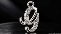 front view of silver CZ letter pendant