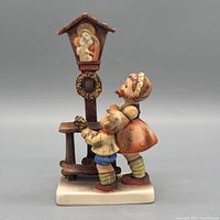 Front view of Goebel Hummel Adoration figurine showing children and shrine