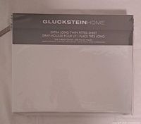Front of sealed GlucksteinHome XL twin fitted sheet package