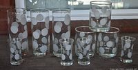 Full set of 10 frosted polka dot glasses arranged together
