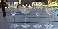 Group of four crystal stems on table