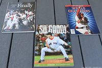 Group shot of all three Red Sox commemorative publications