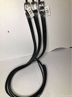 Three new men's black leather belts, size 46, arranged side by side with visible tags from J Scott and MSRP $34.99.