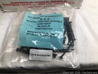 Image of a single sealed bag containing 100 black 2-inch Quadrex screws with Robertson bits, labeled with product specifications including size and manufacturer.