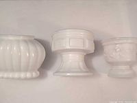 All three white milk glass pieces side by side