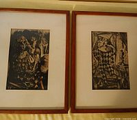 Both framed woodcuts side by side