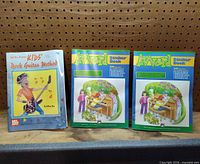 All three books standing side-by-side