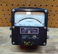 Front view showing meter face, scale, brand plate
