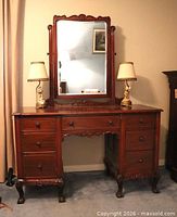 Front view of dresser with mirror