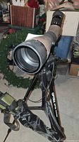 Cabela's spotting scope mounted on Optex OPT50 tripod, view of objective lens