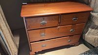Front view of solid wood dresser closed