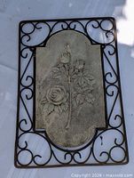 Full view of plaque showing frame and resin panel