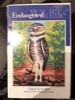 Front of boxed set showing title and sample owl illustration