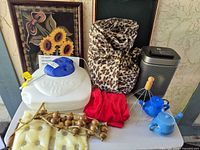 Overall lot showing vaporizer, heater, blanket, pads, massagers, NeilMed pots