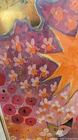 Close-up of floral area with gold accents