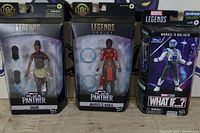 Front view of all three boxed figures: Shuri, Nakia, Goliath