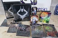 Group shot of all portfolios and Pokémon tins