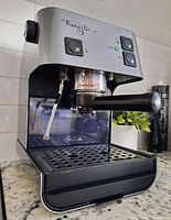 Front and side view of Starbucks Barista espresso machine