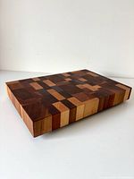 Perspective view showing checkerboard end-grain pattern and thickness