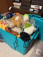 Tote filled with mixed coloured yarn skeins
