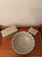 Bowl, rectangular box, square box displayed together
