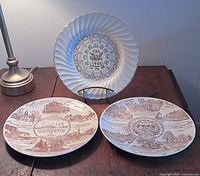 All three plates displayed with holder