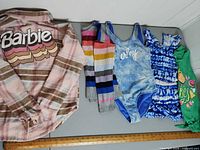 Overall lot layout showing all five garments