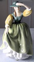 Front view of Royal Doulton Buttercup figurine