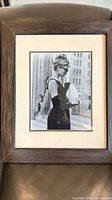 Framed photograph showing full image and frame
