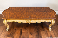 Full frontal view of coffee table showing top, apron and legs