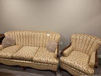 Sofa and armchair showing overall design and upholstery
