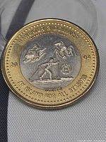 Obverse of token showing winter design and text