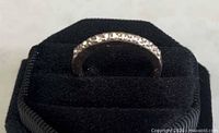 Ring front view showing diamond row