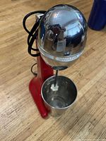 Front view of Hamilton Beach milkshake maker with mixing cup