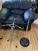 Snare drum stand and microphone stand side by side