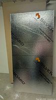 Front view of one Silverboard reflective insulation panel displaying foil surface and branding