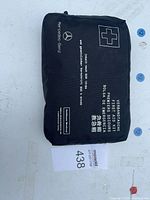 Front of black Mercedes-Benz first aid kit pouch