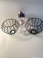 Full lot view showing two wire bowls and tube of stirrers