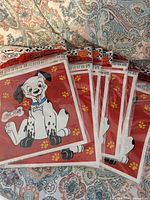 Front view of six sealed banner packs with Dalmatian design