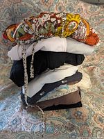 Stack of folded garments showing colours and variety
