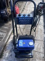 Front view showing Simoniz 2900 PSI control panel, blue fuel tank, frame and wand