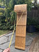 Full view of toboggan front with rope and logo